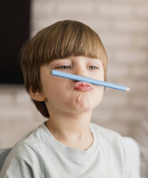 front-view-child-posing-silly-during-tutoring-session7